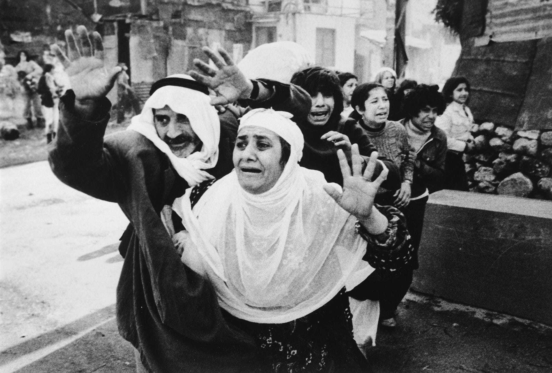 A Palestinian man and woman beg mercy from Christian gunmen in Beirut during the Lebanese Civil War. Don McCullin for the Sunday Times A Palestinian man and woman beg mercy from Christian gunmen in Beirut during the Lebanese Civil War. Don McCullin for the Sunday Times