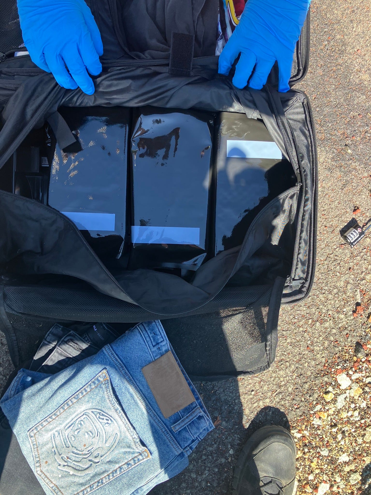 May be an image of tool bag and text