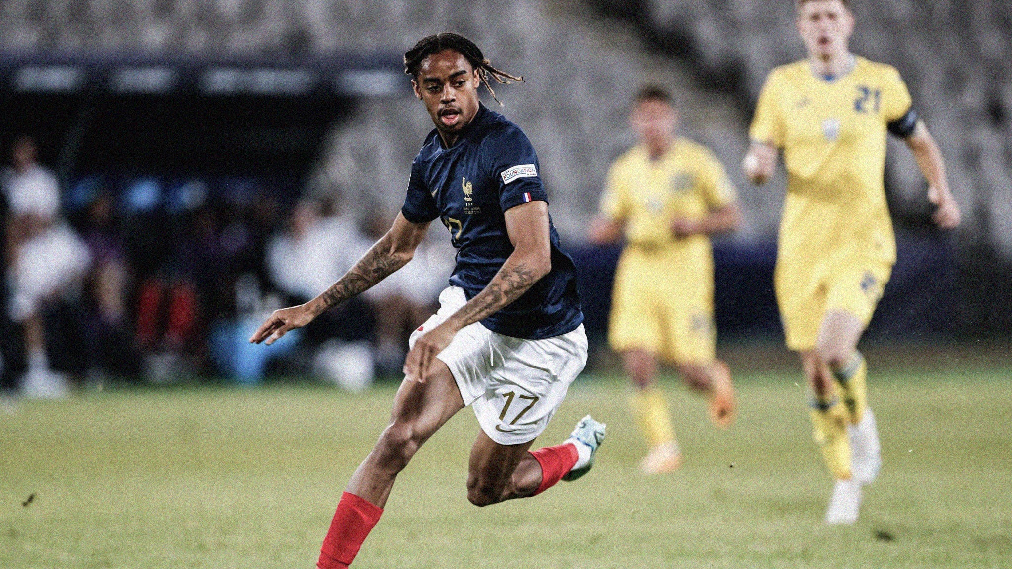 A photo of France's Bradley Barcola running after the ball at the 2023 UEFA U-21 EURO
