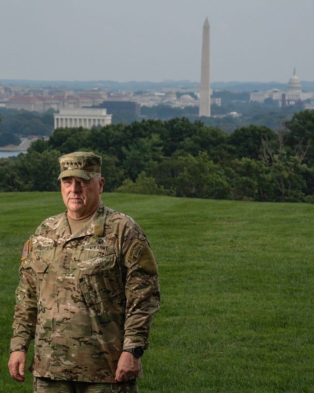 A photograph of General Mark Milley with the Washington, D.C., skyline in the background