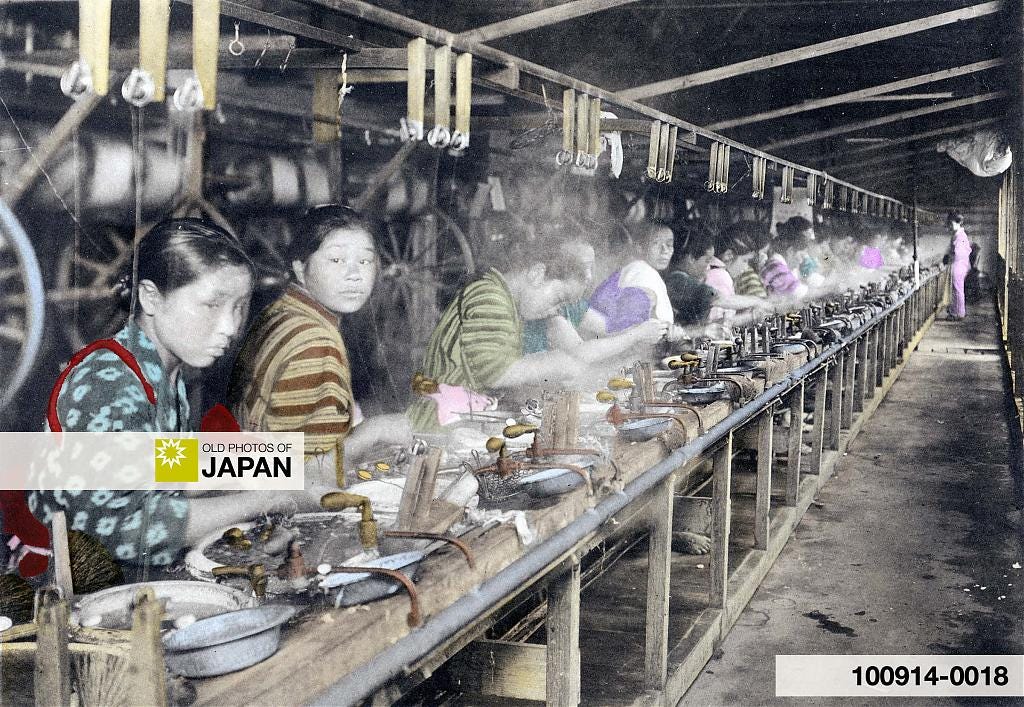 Japanese women at a silk factory reeling silk from cocoons, 1910s
