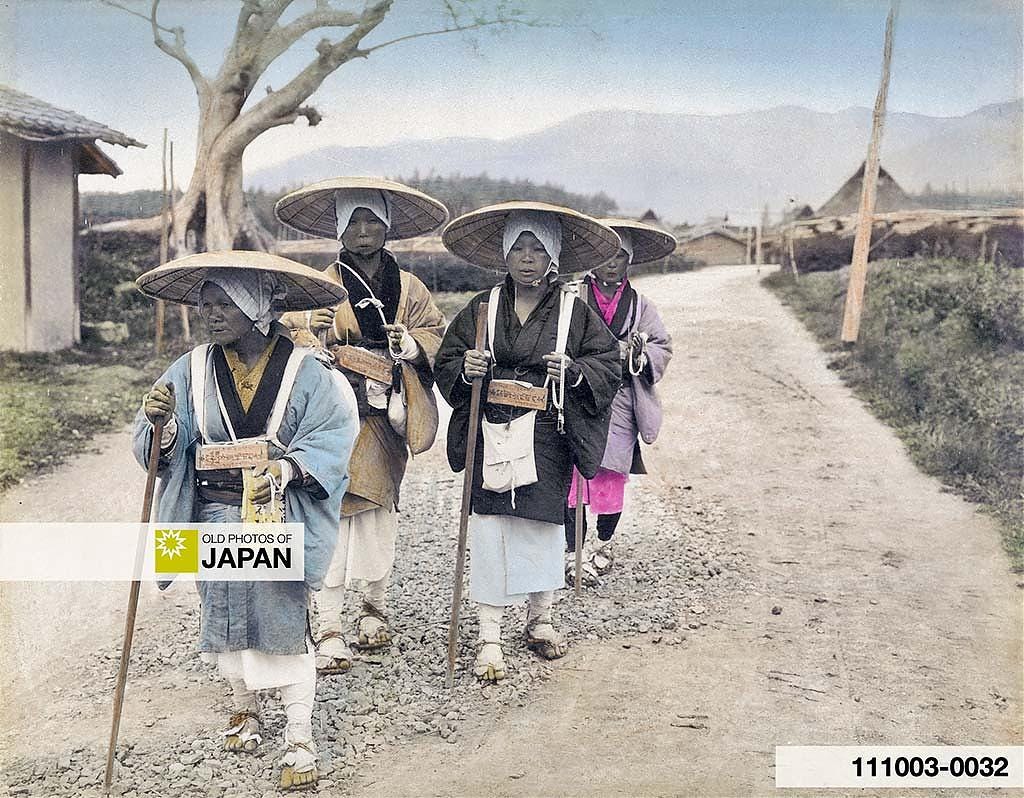 Hand colored albumen print of four female Japanese pilgrims on the road, ca. 1890s