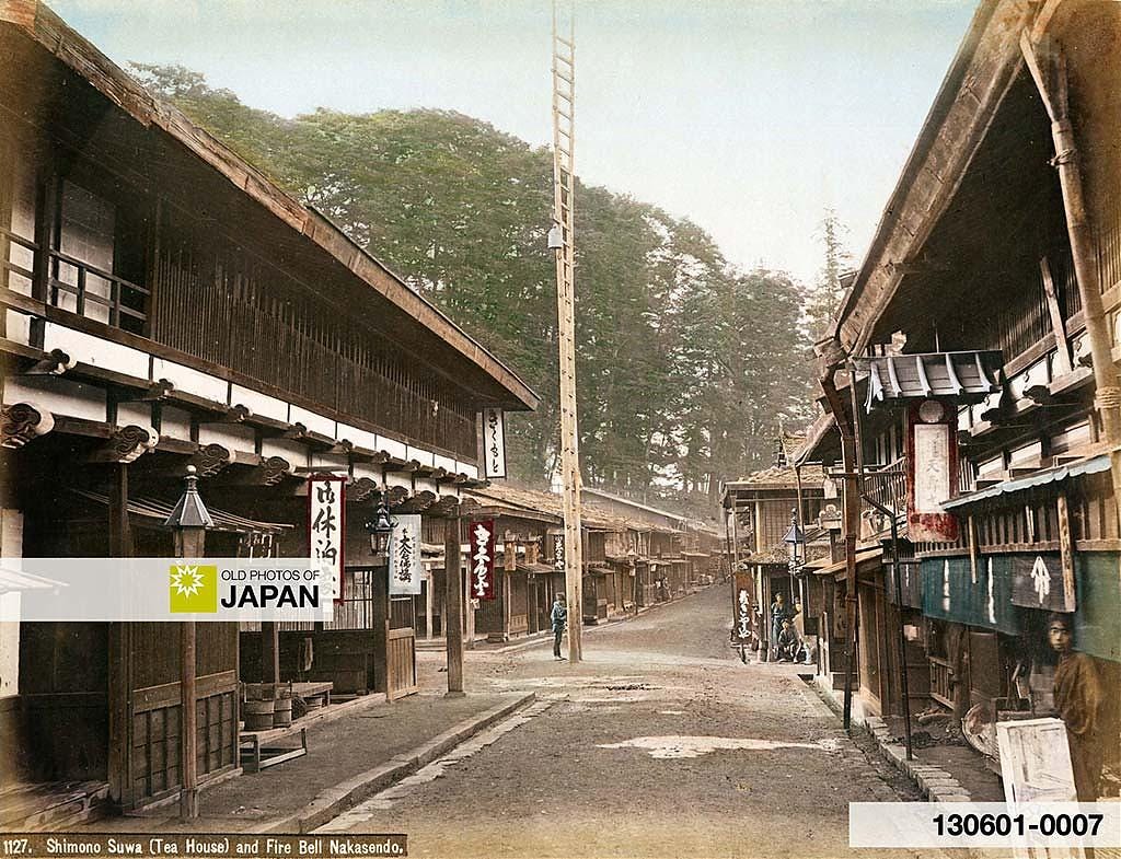 Hand colored albumen print by Kimbei Kusakabe of inns at Shimonosuwa Juku in Nagano Prefecture, ca. 1880