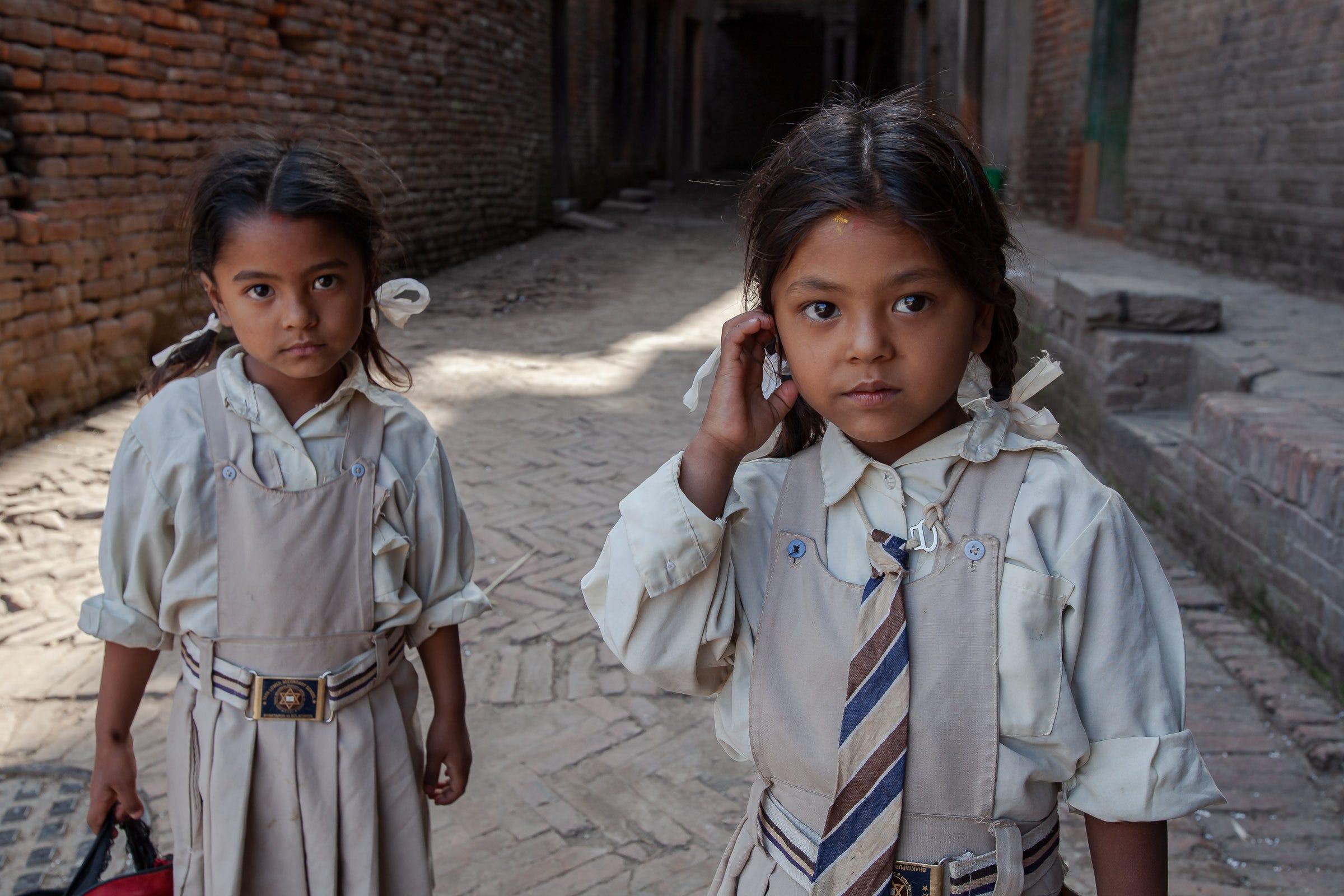 Sisters Yamuna and Jamuna, Bhatapur, Nepal. 1/125, f/8, ISO400, 35mm