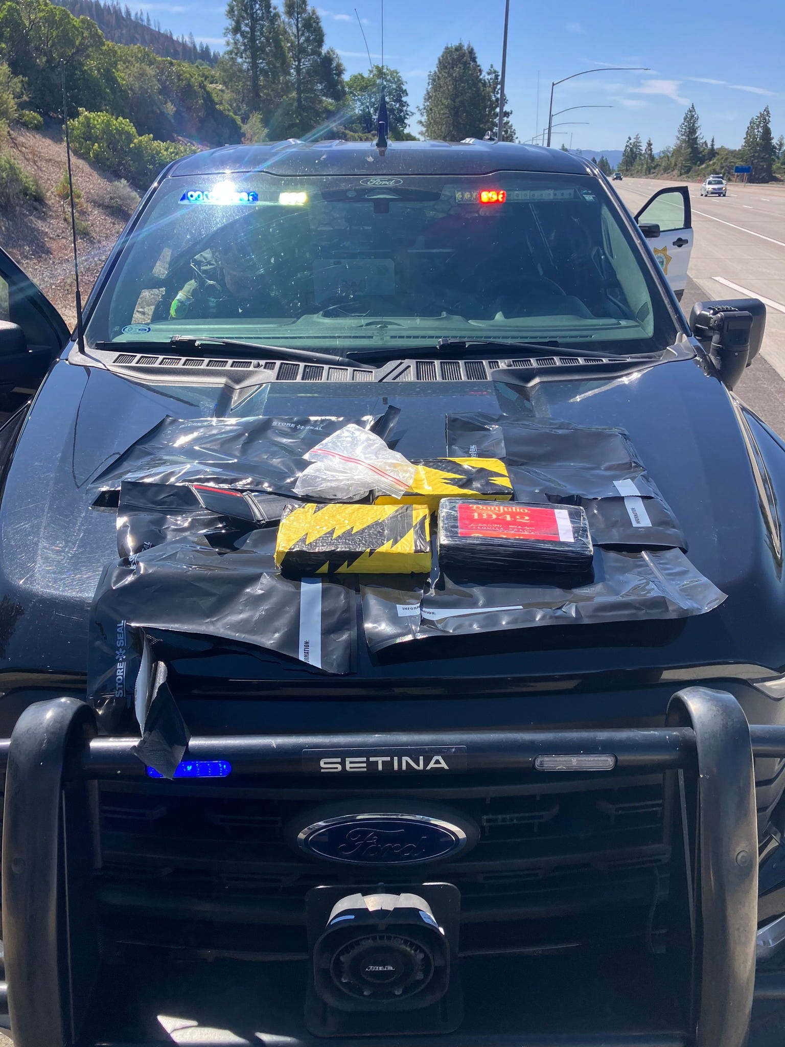 May be an image of ambulance and text