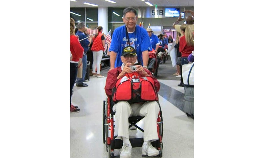 Ron and Alfred Chan return to a hero's welcome at SFO on the return of their Honor Flight.