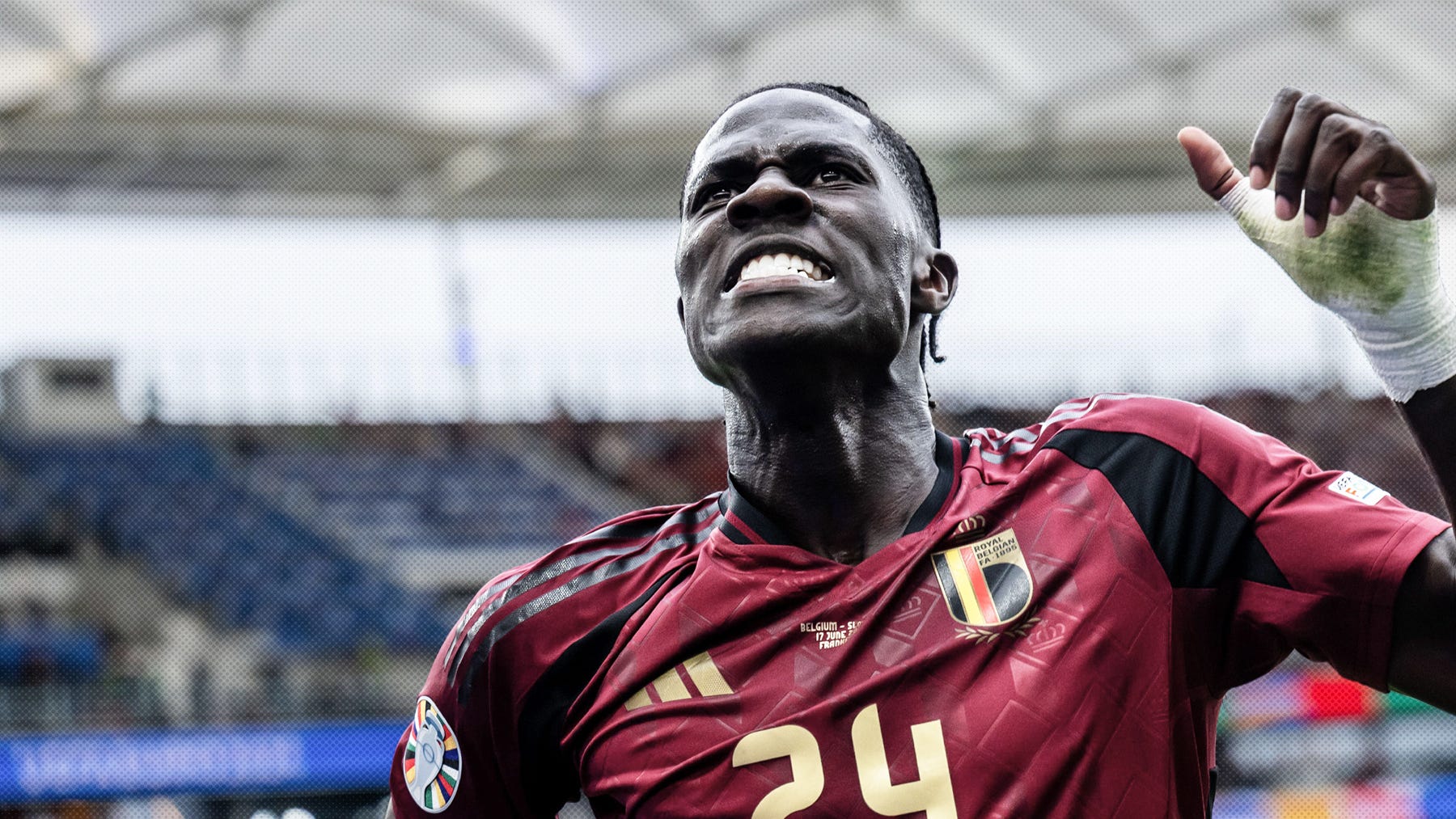 An edited close-up photo of Amadou Onana celebrating a goal against Slovakia at EURO 2024