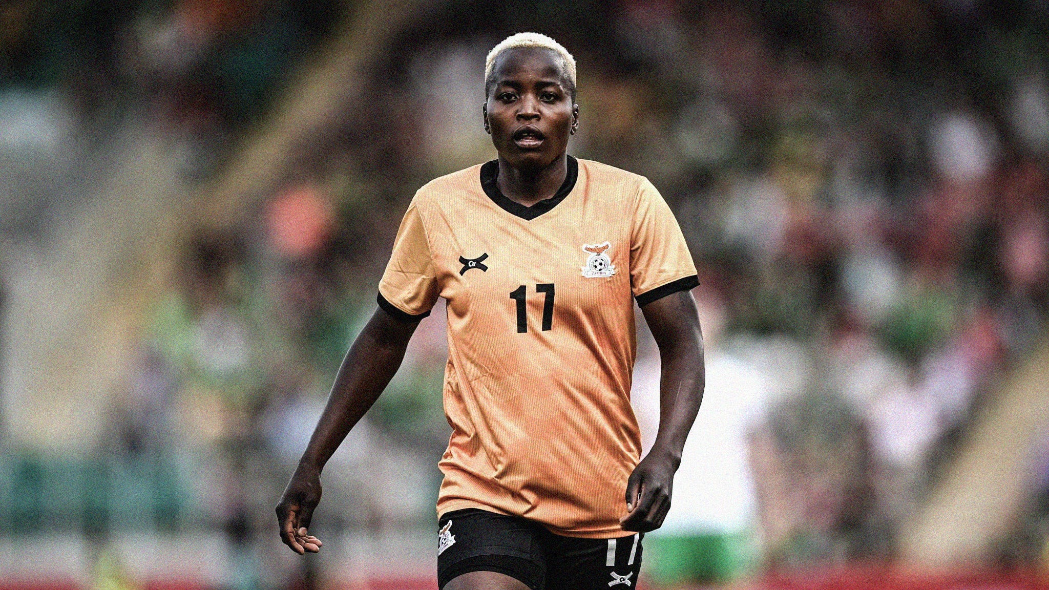 A photo of Racheal Kundananji looking at the camera while playing for Zambia