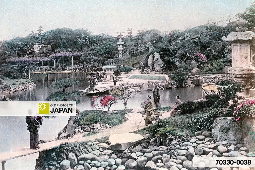 Hand colored albumen print by Kuichi Uchida of a traditional Japanese garden in Tokyo, ca. 1869