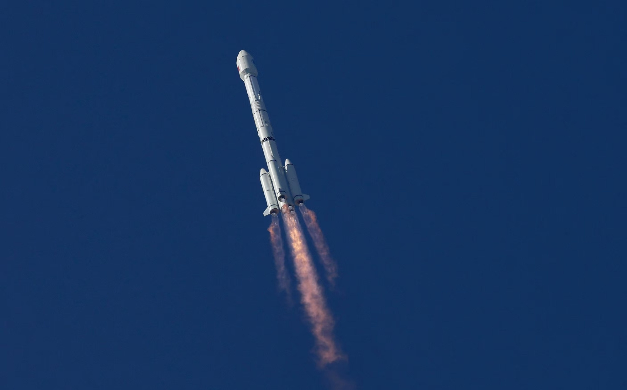 The Long March 3B/E Y80 vehicle during first-stage flight.