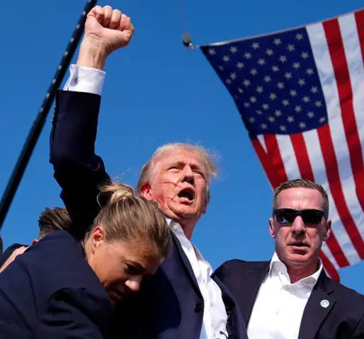 Evan Vucci's photograph showing a bloodied Donald Trump being escorted away by Secret Service agents immediately after the shooting

The above file's purpose is being discussed and/or is being considered for deletion. See files for discussion to help reach a consensus on what to do.