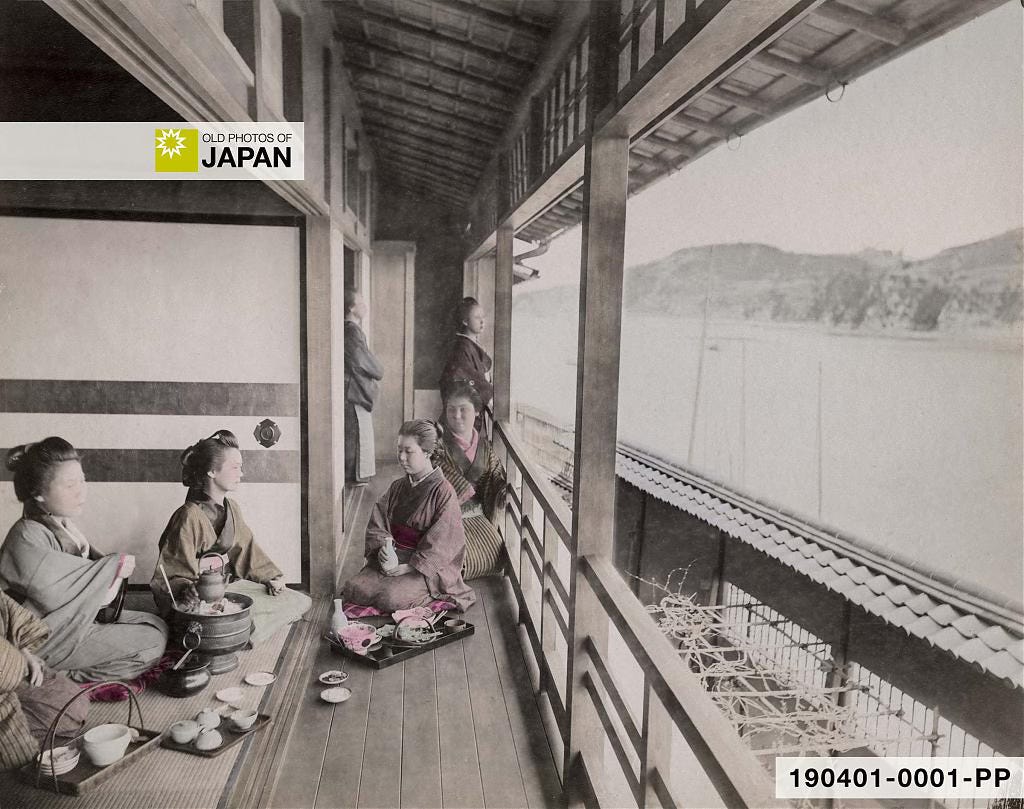 Guests around a hibachi charcoal brazier at a Japanese inn, 1890s Guests around a hibachi charcoal brazier at a Japanese inn, 1890s