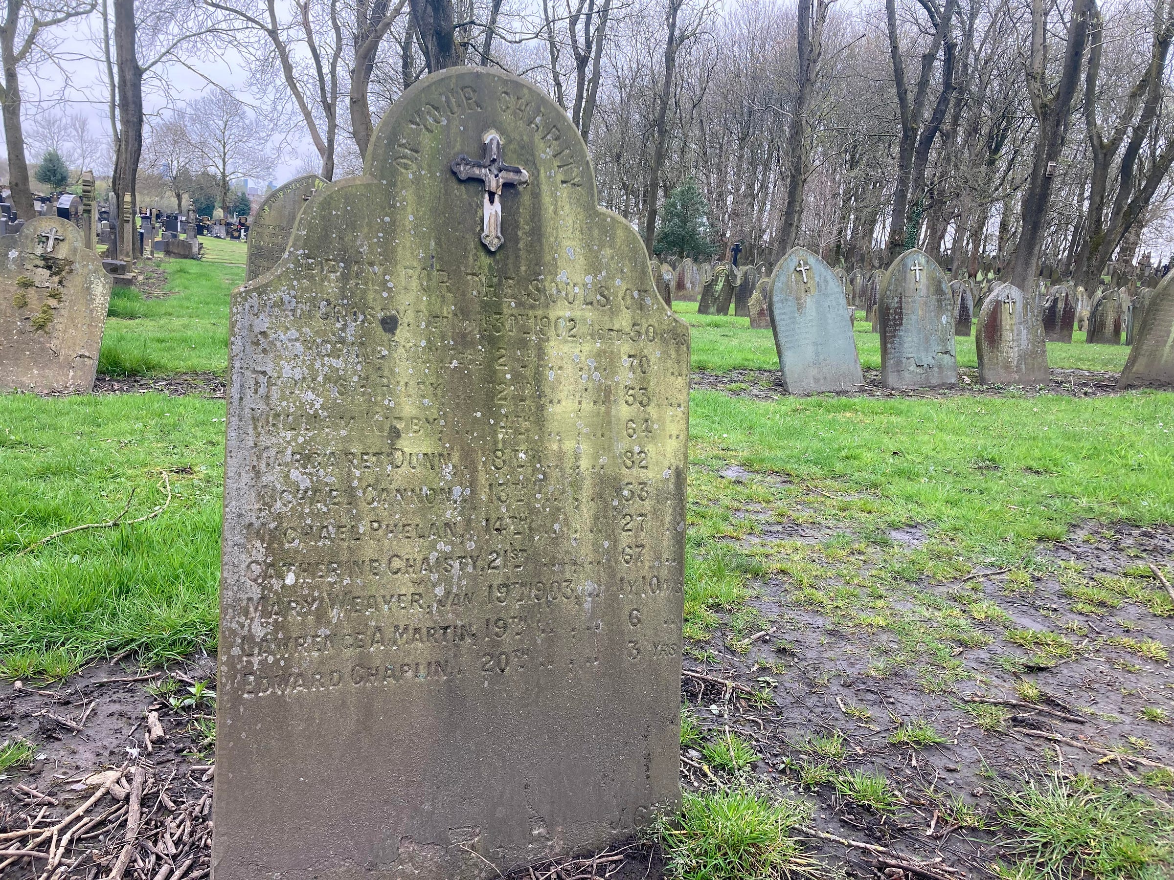 Photograph of an old graveyard and the tombstone of William Kirby, it is his gravesite in Manchester.