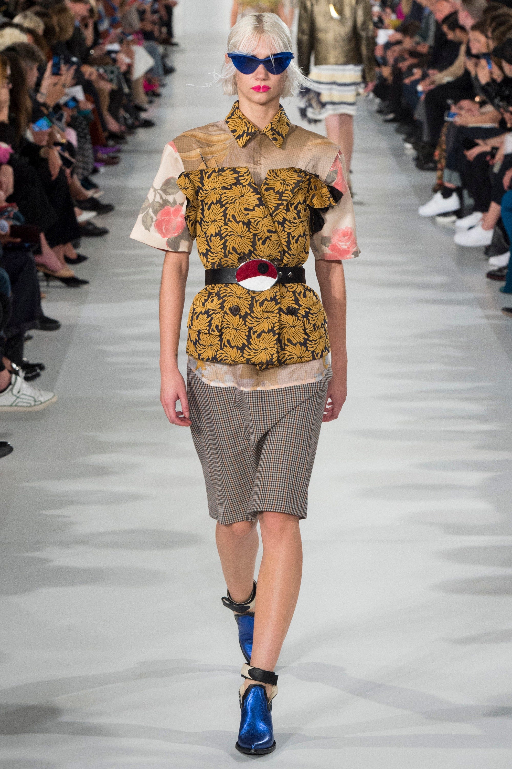 Image may contain Human Person Sunglasses Accessories Accessory Runway Fashion Clothing Shoe Footwear and Apparel