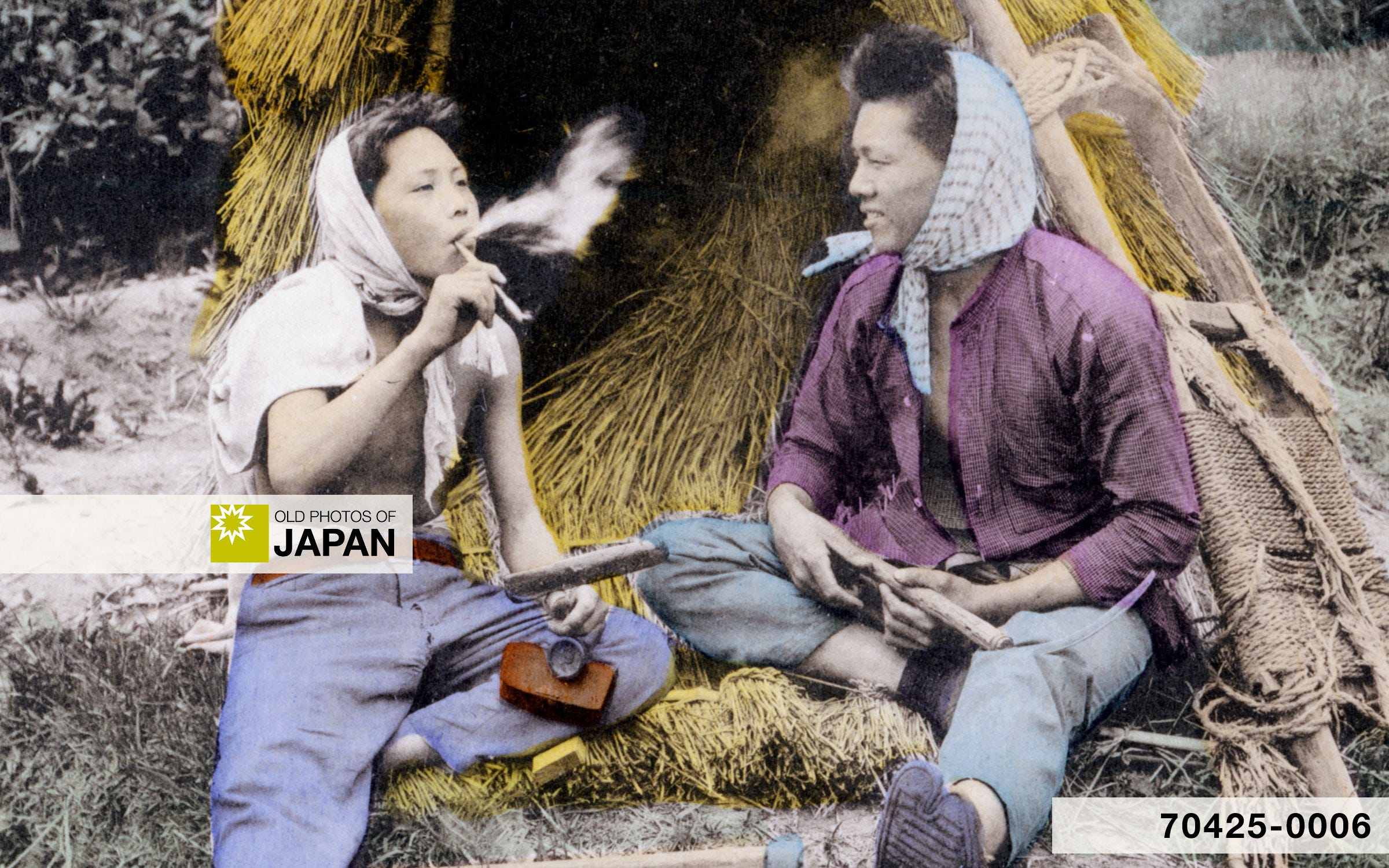 Young Japanese farmer smoking a kiseru pipe during a break, 1920s