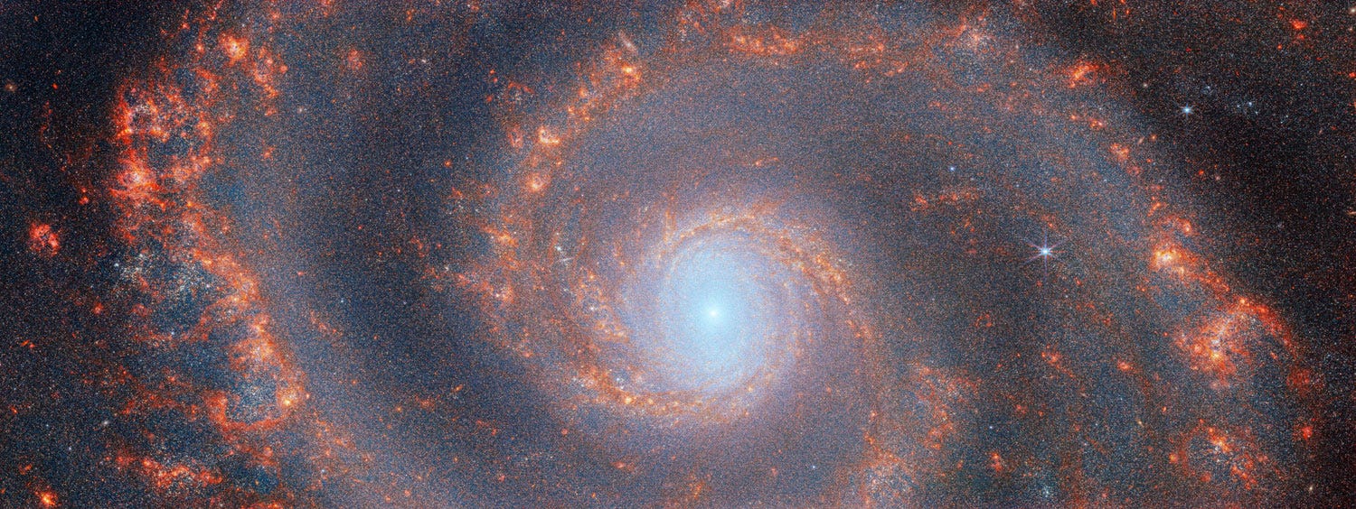 Same as the image above, but the major spiral arms of the galaxy are more obvious.