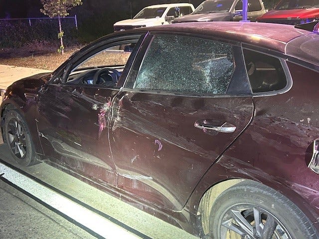 May be an image of car and text