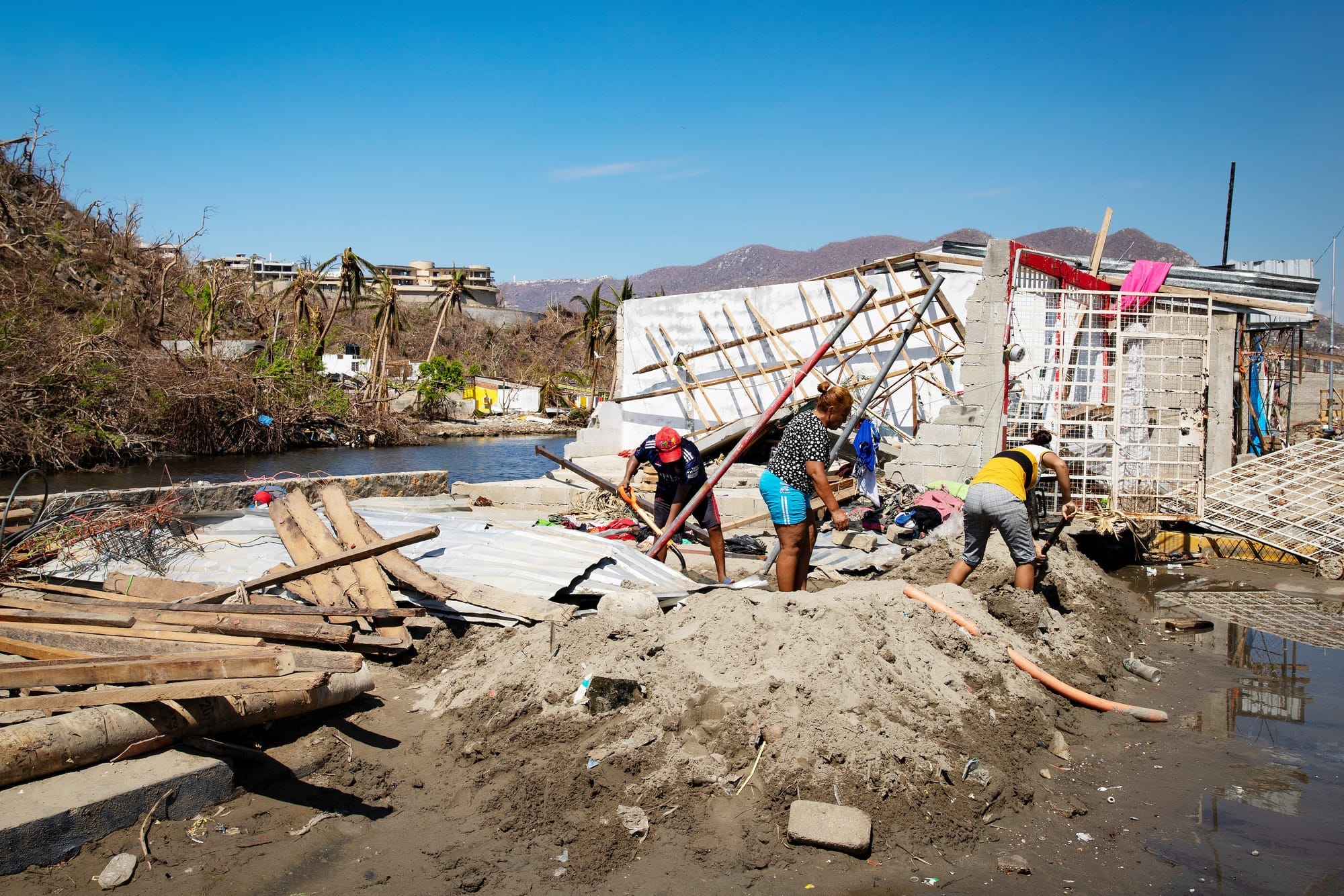 People in acapulco start clearing debris after it was smashed by the hurricane otis in october 2023