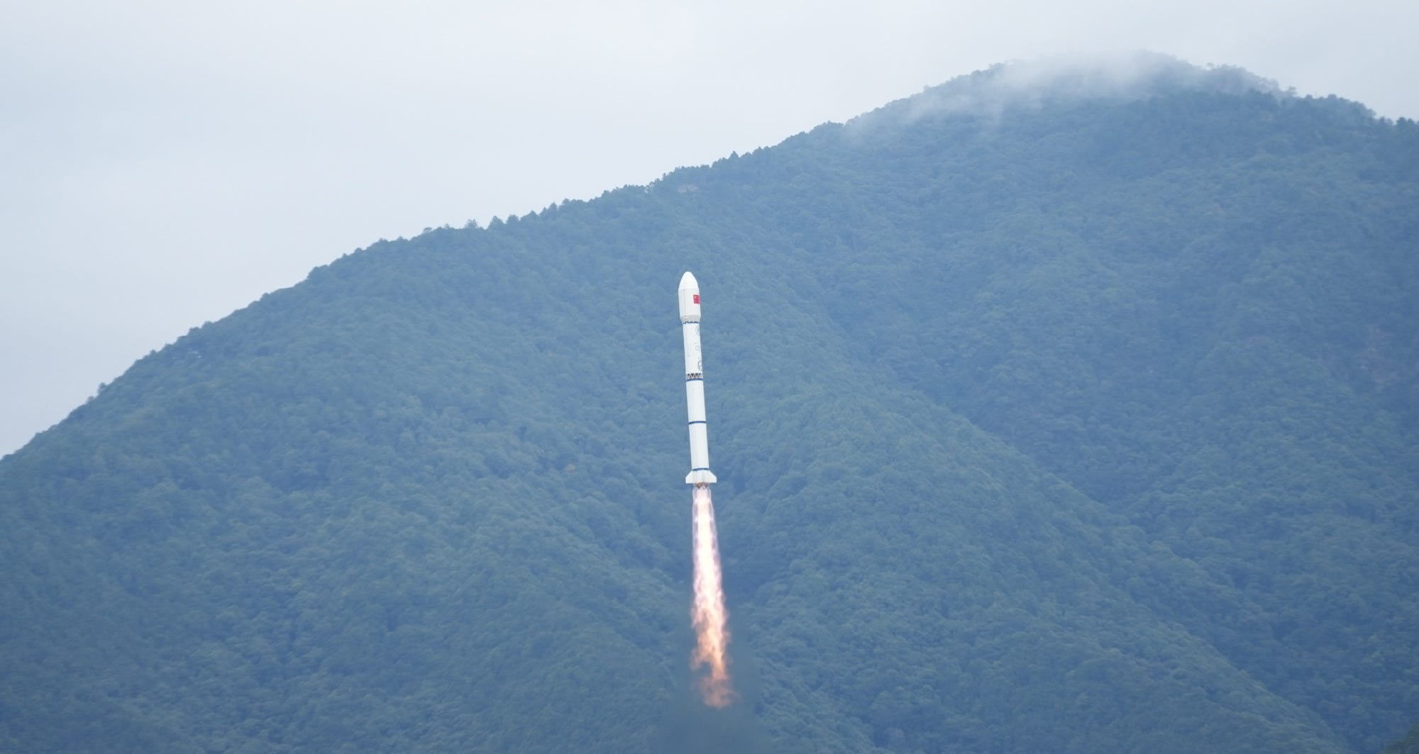 The Long March 2C Y87 vehicle lifting off from the Xichang Satellite Launch Center.