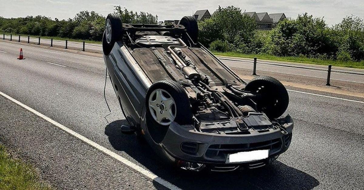 Car flips onto roof after 'driver spooked by spider'