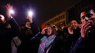 Palestinian supporters celebrate news of a ceasefire with Israel, in Berlin, Germany. Reuters