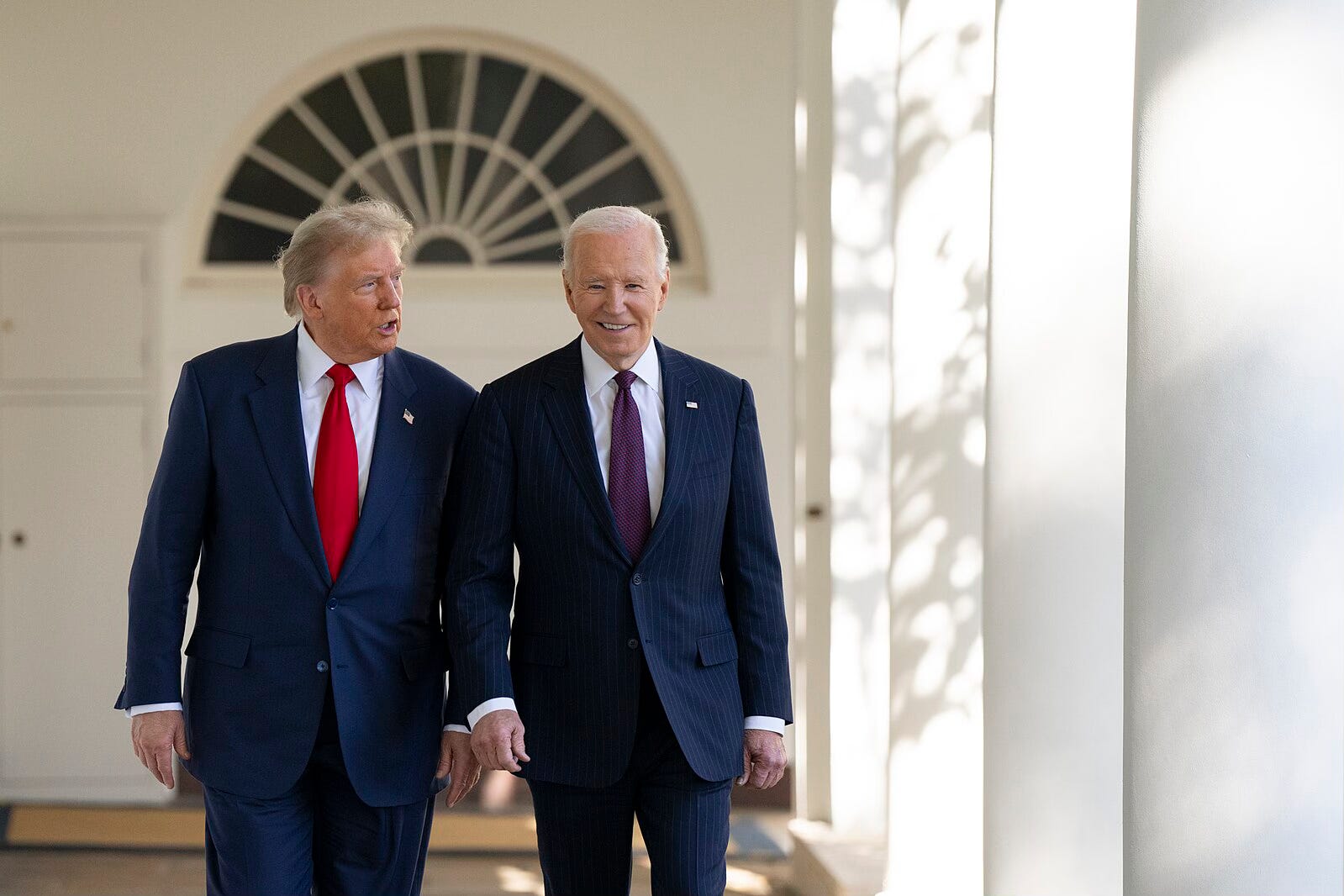 Trump walking with Biden