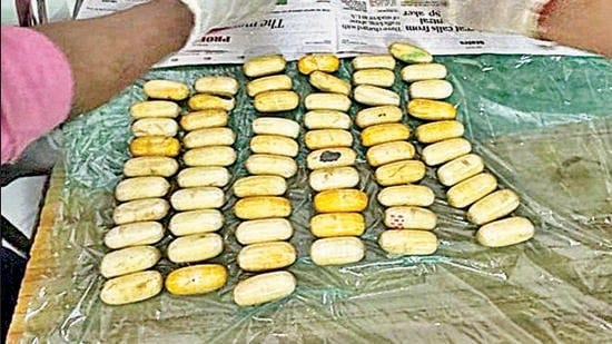 A total of 74 capsules, containing 1.1 kg of cocaine, were recovered from his body and seized on Saturday.