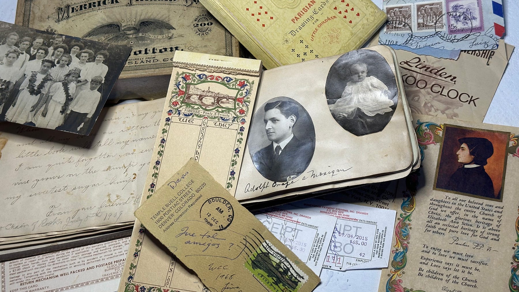 Photo of a pile of paper ephemera, including old photos, cards, receipts and such, many from over 100 years ago
