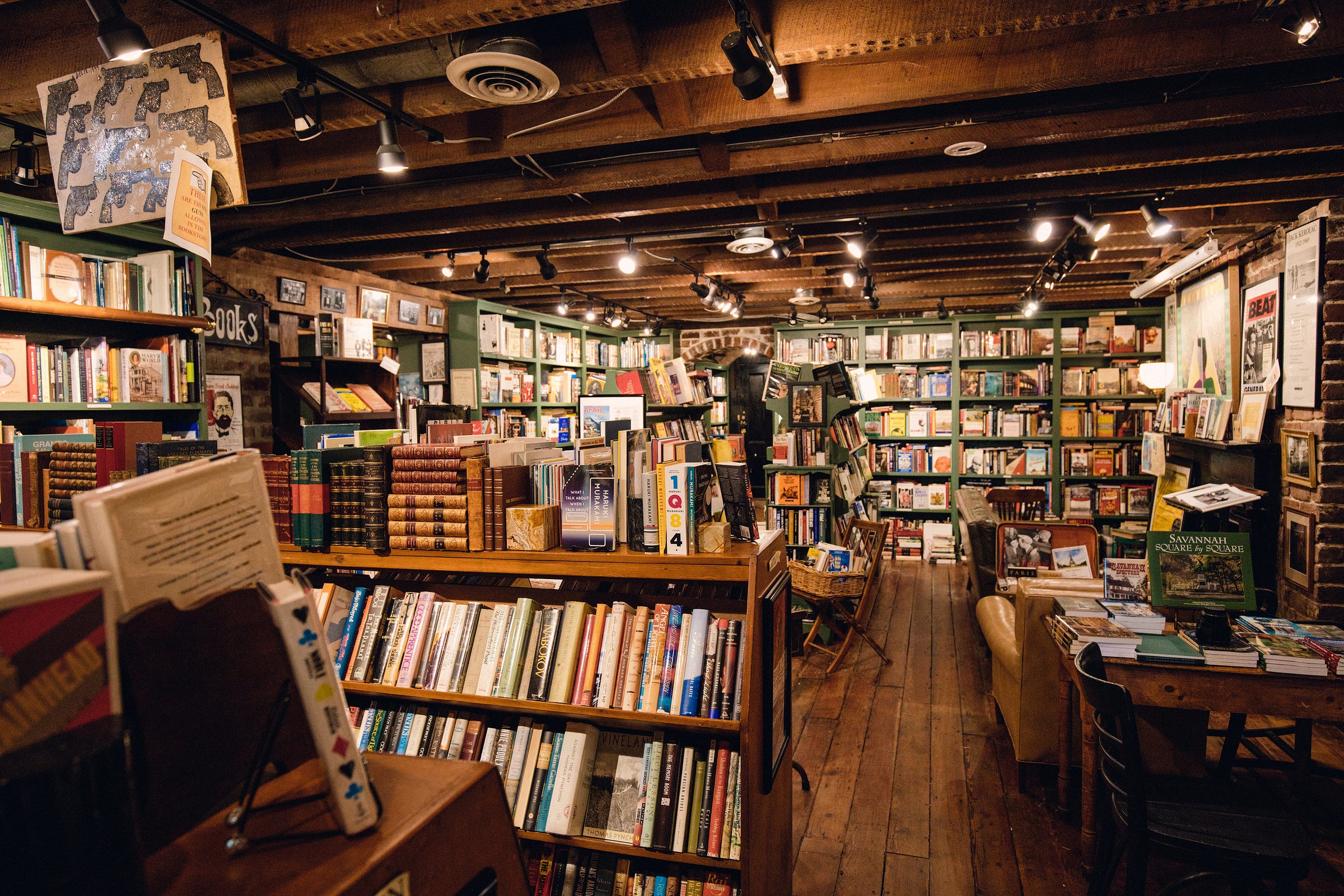 photo of book shelves in a basement-level book store