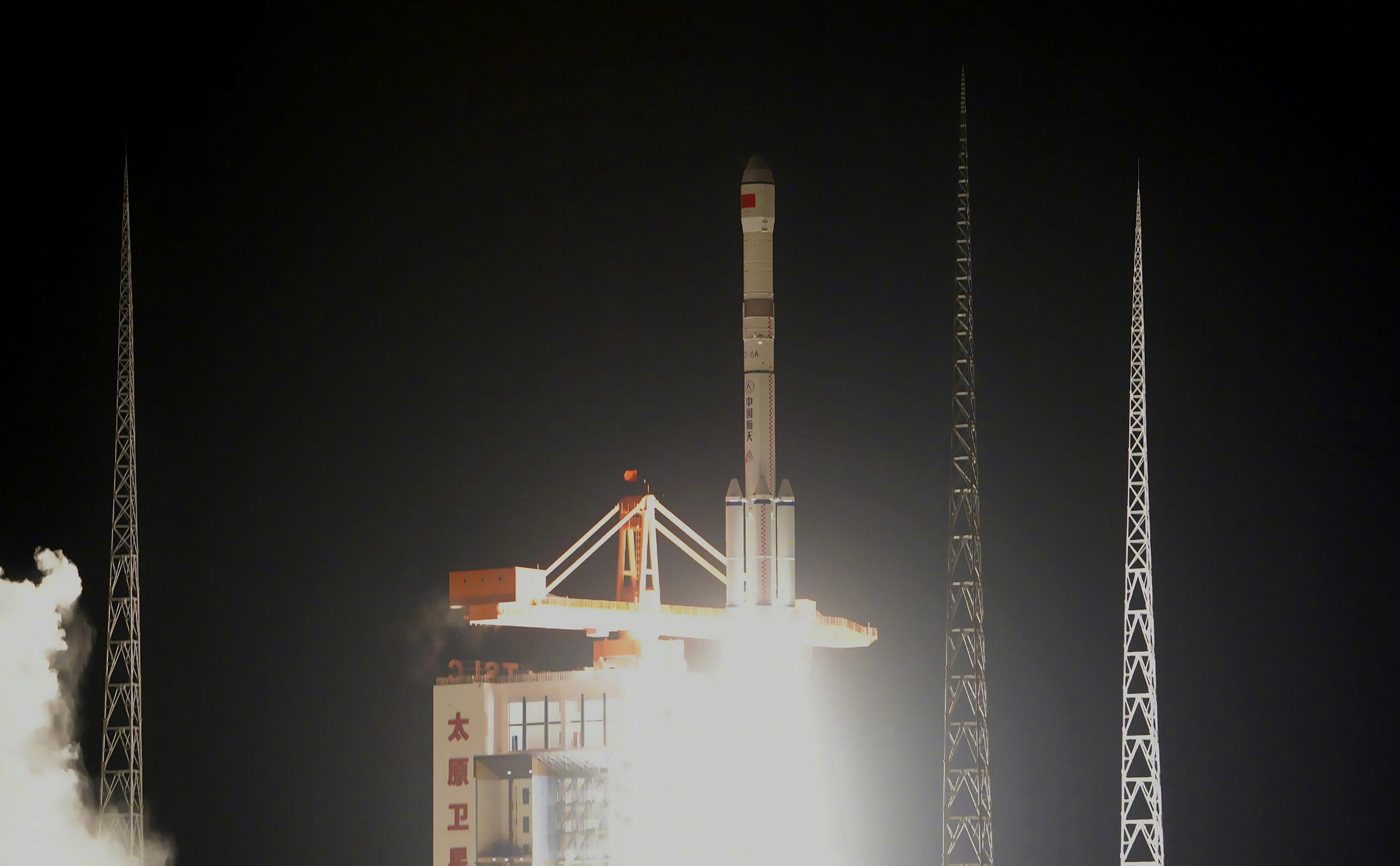 The Long March 6A Y9 vehicle clearing Launch Complex 9A’s tower.