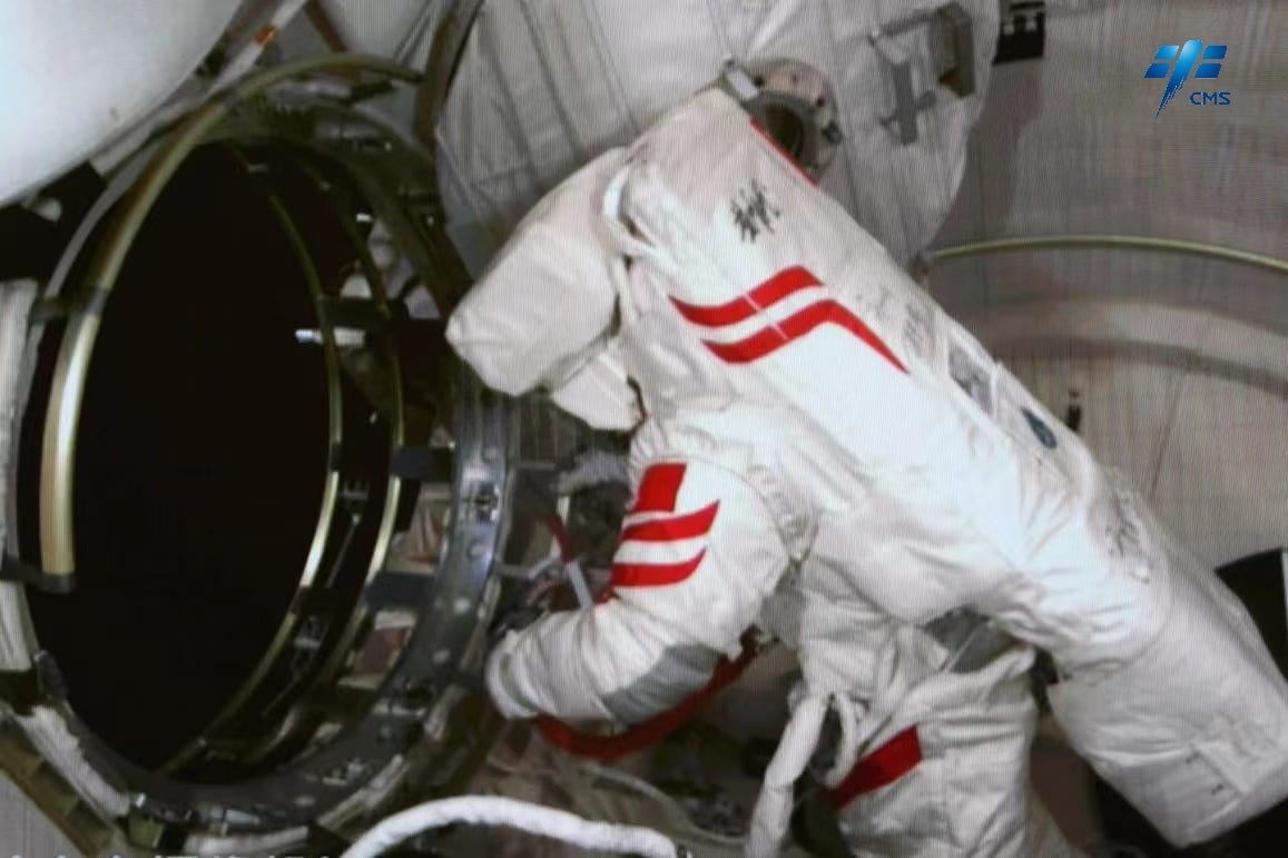 Cai Xuzhe exiting the Wentian module at the beginning of the second spacewalk.