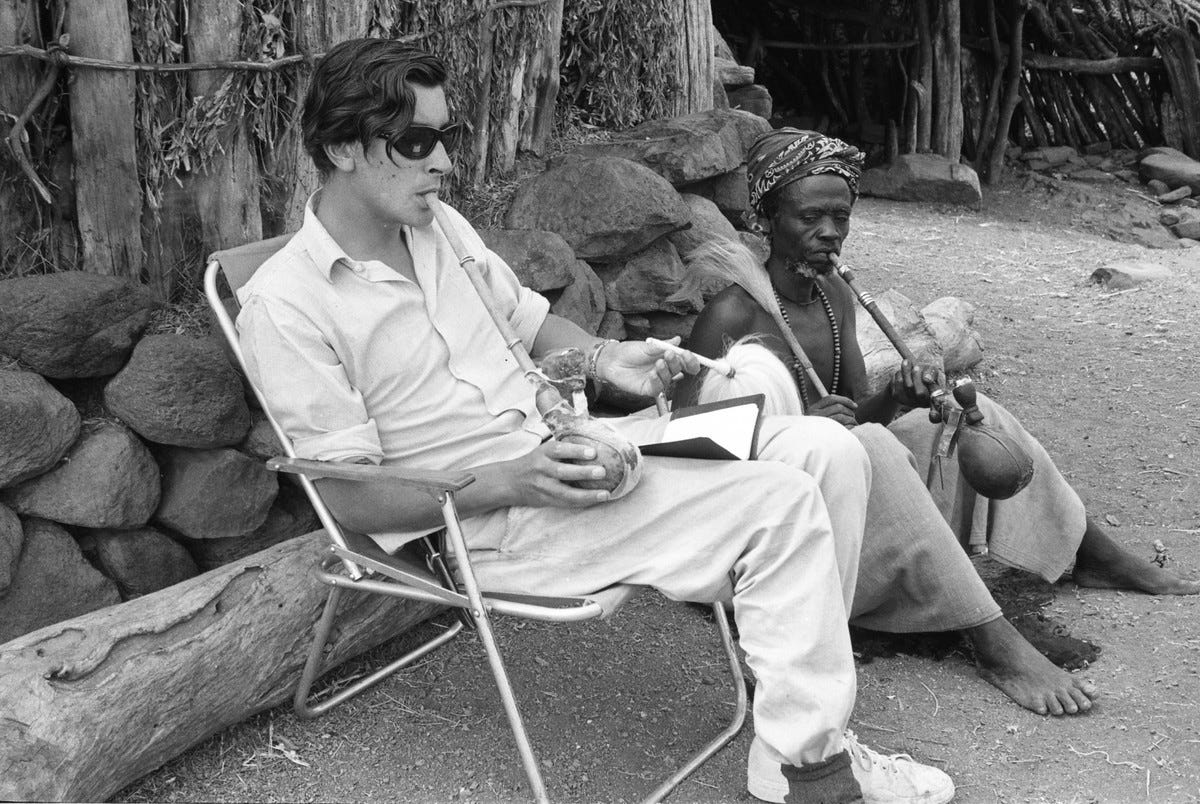 C. R. Hallpike smoking a traditional Konso pipe, Ethiopia, 1965