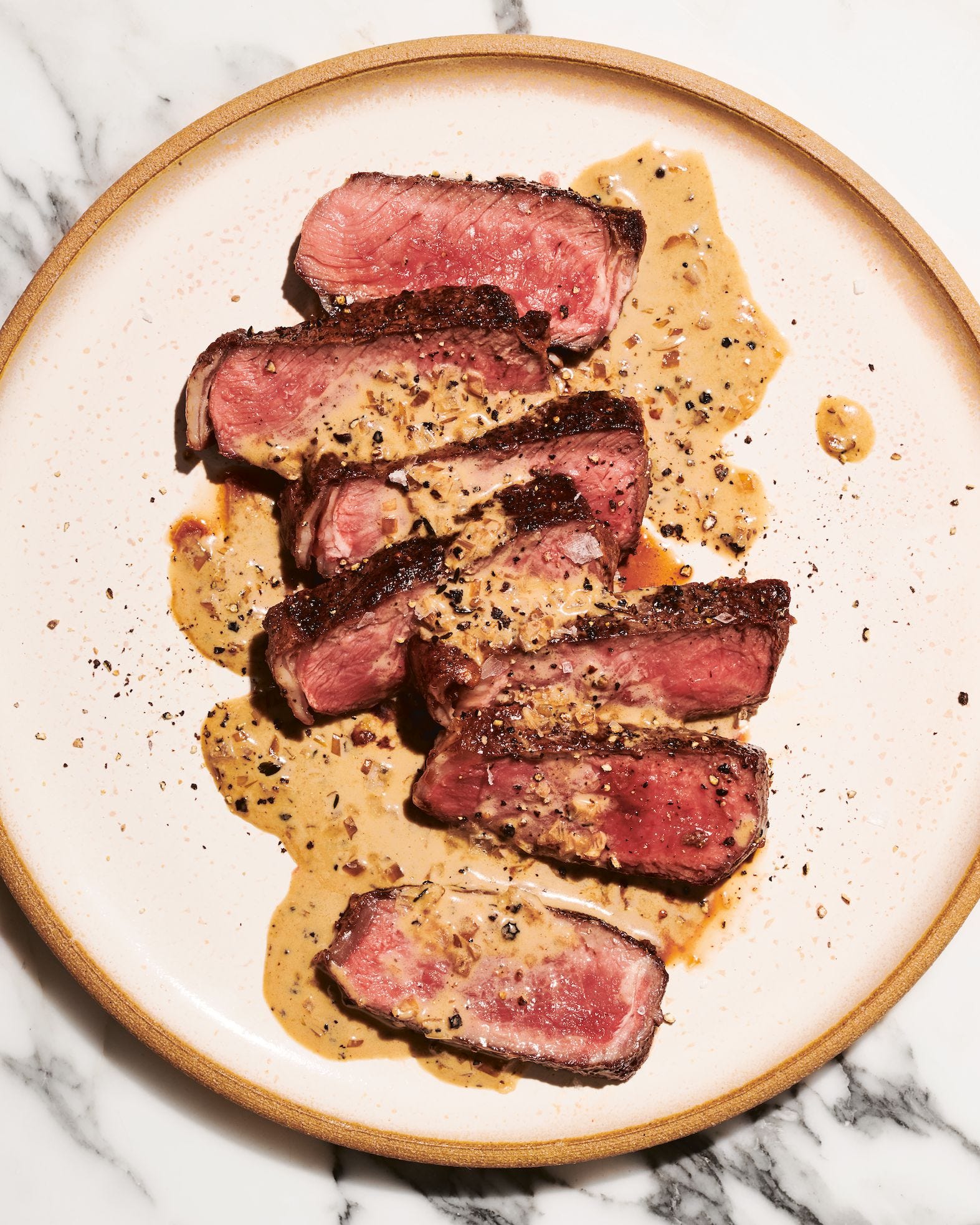 Strip Steaks au Poivre by Molly Baz