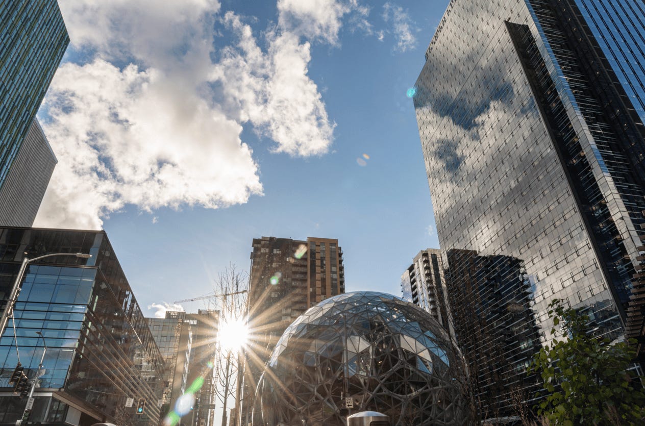 A large glass ball in a city

Description automatically generated