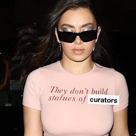 They don't build statues of curators.