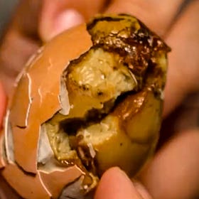 This should be Laos' National Dish: Khai Being (Seasoned Baked Eggs) 