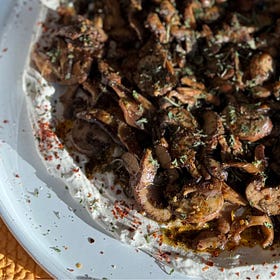 Sautéed Mushrooms Over Tahini Labneh from Our Community Table