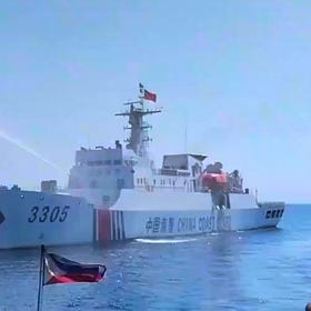 Philippines: Chinese Guard Guard Again Water Cannons Philippine Supply Vessels