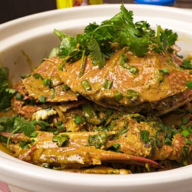 Poo Pad Pong Karee (ปูผัดผงกะหรี่): A deliciously spicy and rich Thai crab curry which leaves you licking fingers!