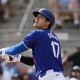 Dodgers’ Shohei Ohtani reacts to his first home run this spring 
