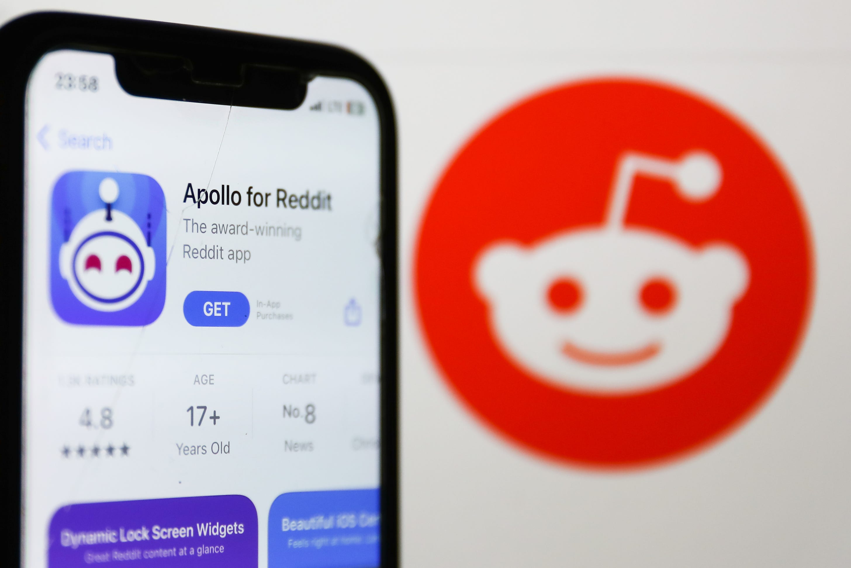 A laptop keyboard and Apollo for Reddit on AppStore displayed on a phone screen are seen in this illustration photo taken in Krakow, Poland on June 8, 2023. (Photo by Jakub Porzycki/NurPhoto via Getty Images)
