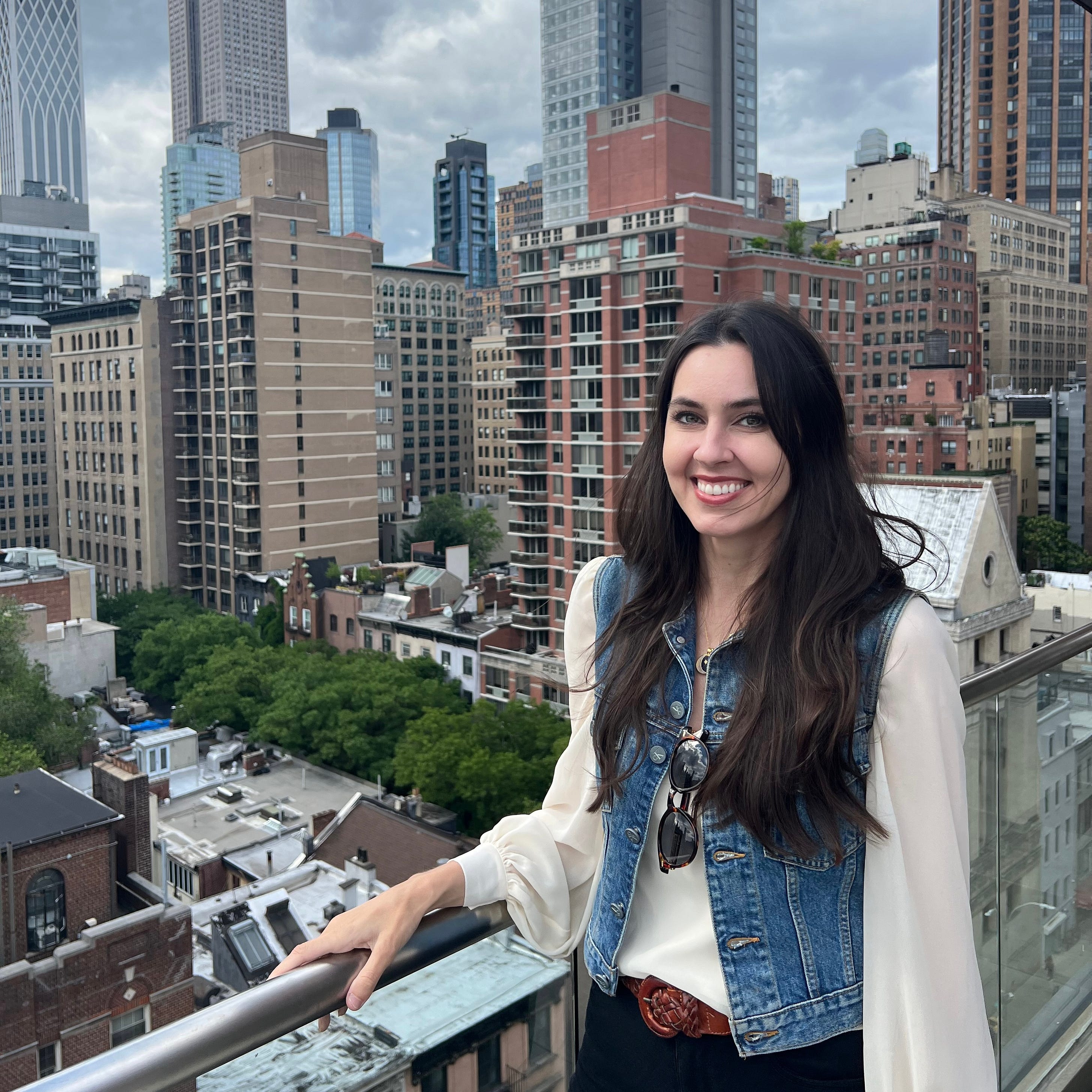 Washington Post tech columnist Taylor Lorenz standing in front of a NYC backdrop