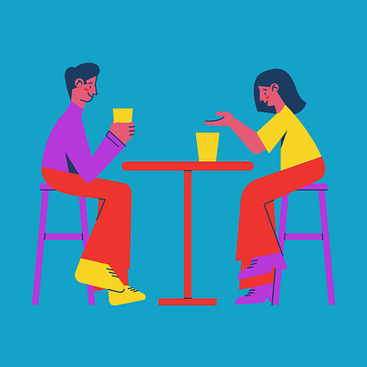 Two people wearing purple and sat at a table having a drink together