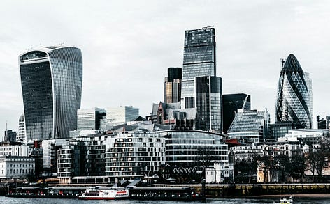 city skyline under white sky during daytime