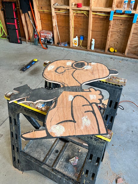 Images of constructing Snoopy yard art