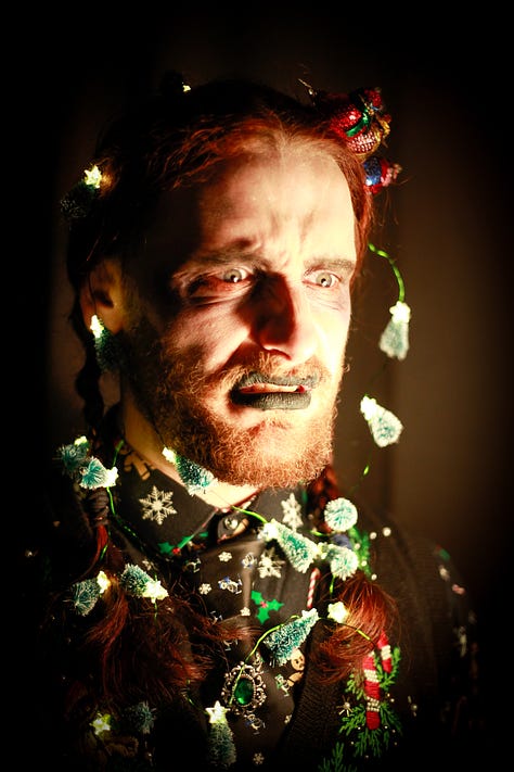 Portraits of Saul Bateman, with Christmas and Halloween props and make up in ambient lighting