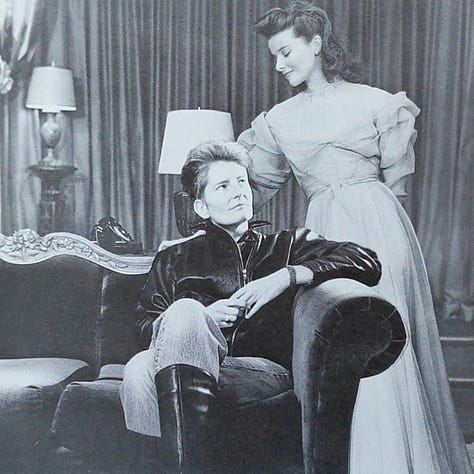 Black and white photographs that are old Hollywood movie stills that have had a lesbian figure collaged into the scene.