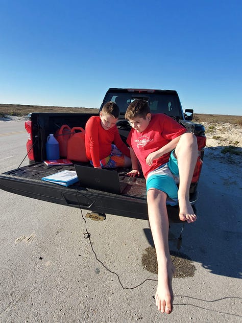 6 images of two boys homeschooling from different places, including an RV and on the beach