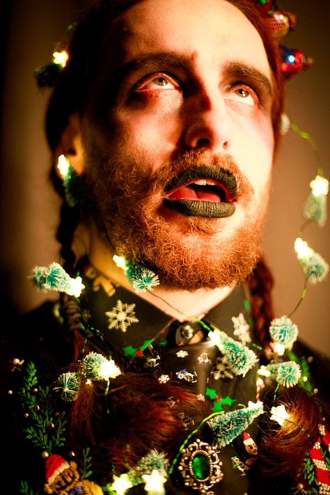 Portraits of Saul Bateman, with Christmas and Halloween props and make up in ambient lighting