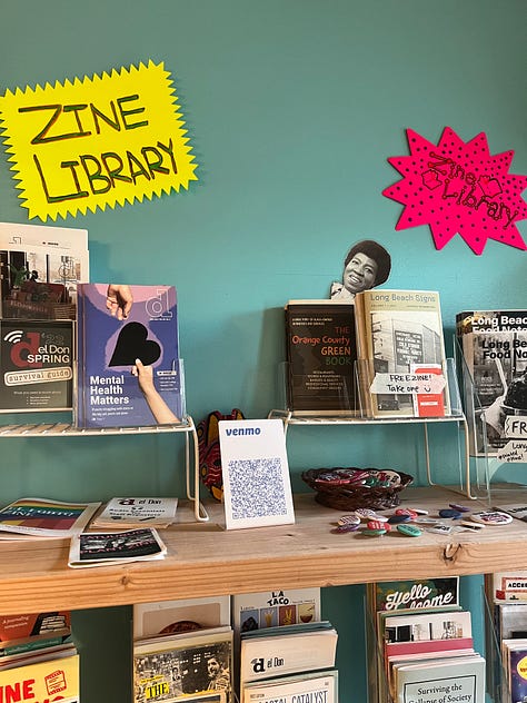 Interior shots  of the print studio and lab, with examples of some publication from their zine library. 
